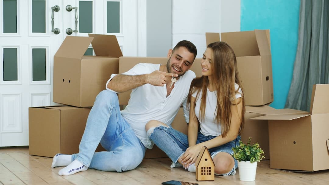 Couple reviewing home ownership documents during Florida divorce and foreclosure