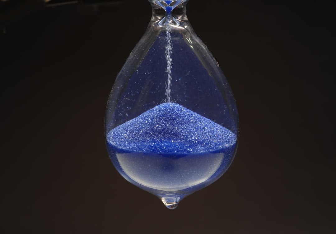 Hourglass representing the Florida foreclosure timeline from missed payment to sale